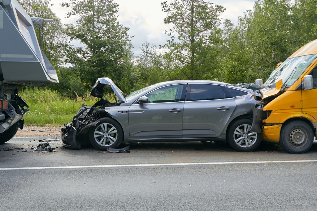 damaged cars on the highway at the scene of an accident because of non-observance of distance, car accident scene in Morganton